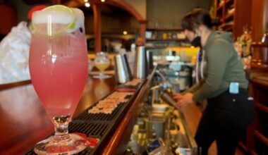 a cocktail sits on a bar