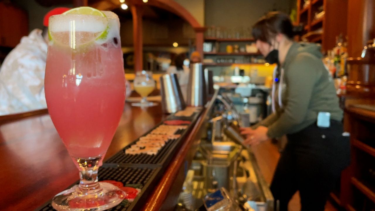 a cocktail sits on a bar