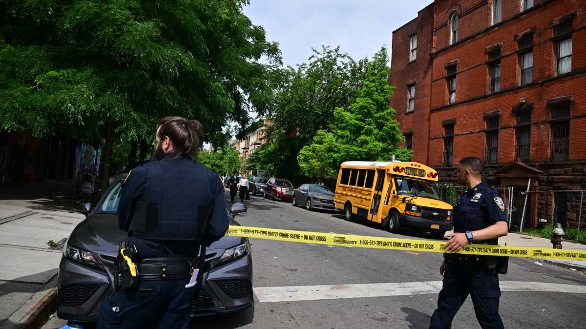 An NYPD officer and the gunman were injured in a shooting stand-off in Brooklyn.