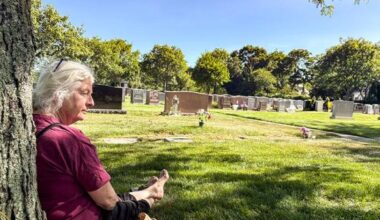 Sitting by Dorothy Day's grave, her granddaughter reflects on faith, family and war