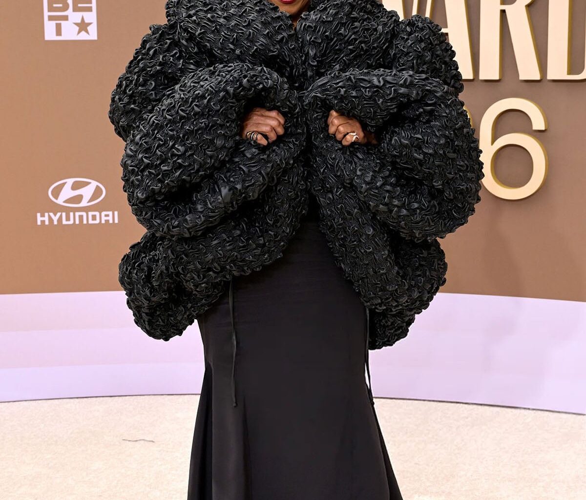 Queen Latifah wears Kilian Kerner Fall 2026 at the 2026 BET Awards before the Lauryn Hill tribute performance.