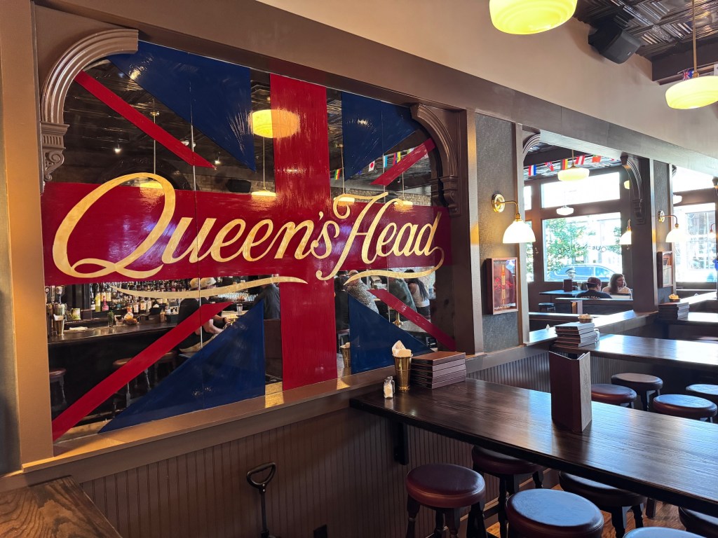 Queen’s Head Pub painted glass in bar.
