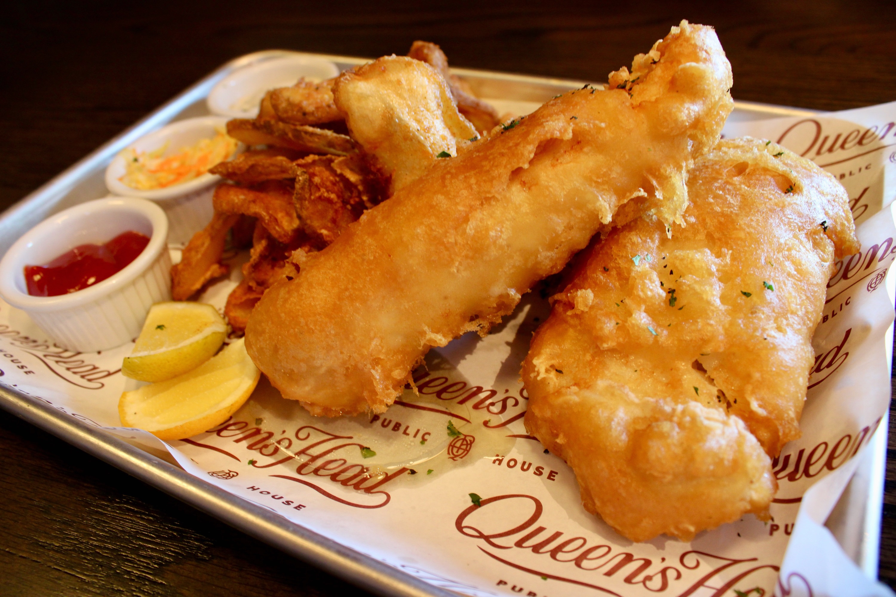 Queen's Head Pub fish and chips with two large fried cod filets.