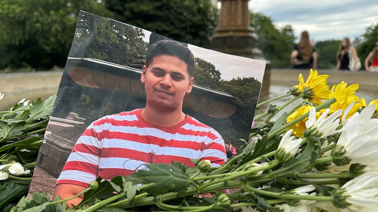 A memorial was held to honor 18-year-old Romanch Mahajan, who was killed last week after a horse pulling a carriage carrying him and his family bolted through the park. (Spectrum News NY1/Daniel Huppert)