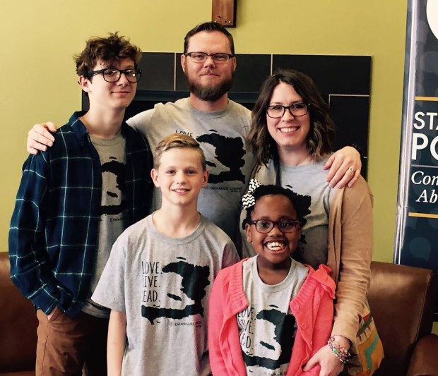 Ethan Williams, far left, is pictured with his father Jason Williams, mother Susan Williams, sister Ella, and brother Aidan in an undated family photo. Williams was killed by a stray bullet while sitting on a stoop in Brooklyn on Oct. 24, 2020.
