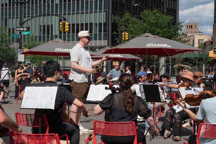 people outside playing musical instruments