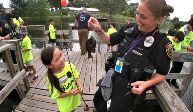 Brooklyn Park Police Reel in the Fun at Kids Fishing Event