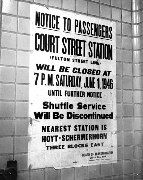 a vintage sign in a train station
