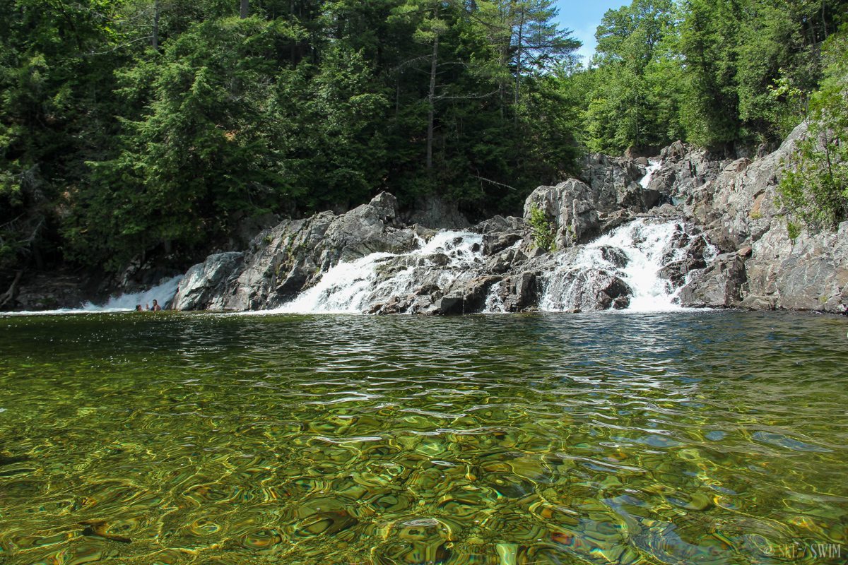 Just 90 minutes from Manhattan sits a natural mountain oasis carved into rugged granite cliffs—offering crystal-clear glacial waters, a 12-foot hidden waterfall, and an escape from the city’s crowded public pools