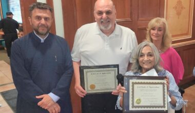 Pete Christofilakes and Christina Charitis were honored with commemorative plaques for their many years of contributions to the efforts of the Philoptochos. Next to them are Fr. Vasileios Apostolidis and Philoptochos President Dee Sidiropoulos. Photo: TNH/Michael Kakias