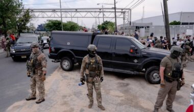 U.S. Immigration and Customs Enforcement agents create a perimeter to let cars enter and exit without disruption by protesters at the Delaney Hall migrant detention center in Newark, N.J., June 6, 2026. New Jersey Gov. Mikie Sherrill, who had been trying for weeks to tour Delaney Hall, was allowed to visit the detention center on Monday, June 8, 2026, but she said she was not allowed to speak with the detainees, who have complained of inhumane living conditions.