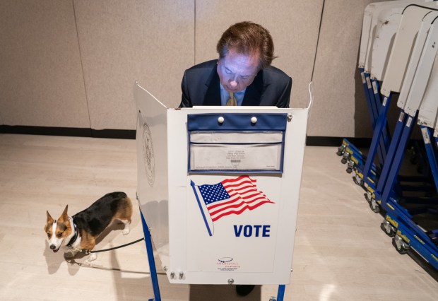 George Conway votes with his dog, Clyde, at The Shed in Hudson Yards Tuesday, June 23, 2026, in Manhattan, New York. (Barry Williams/ New York Daily News)