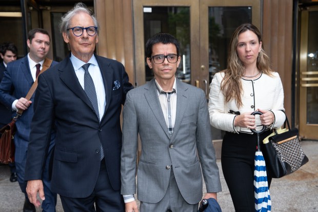 Quilbvio Espinal leaves Manhattan Supreme Court with his attorney, Robert Gottlieb, Tuesday, June 23, 2026.