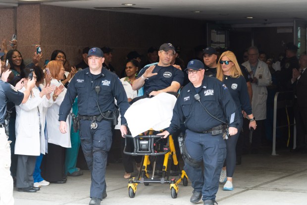 NYPD Detective Matthew Gale is discharged from Kings County Hospital Center in Brooklyn, New York on Tuesday, June 23, 2026. Gale was shot in the leg by a barricaded suspect in Bedford-Stuyvesant on June 19. (Gardiner Anderson / New York Daily News)