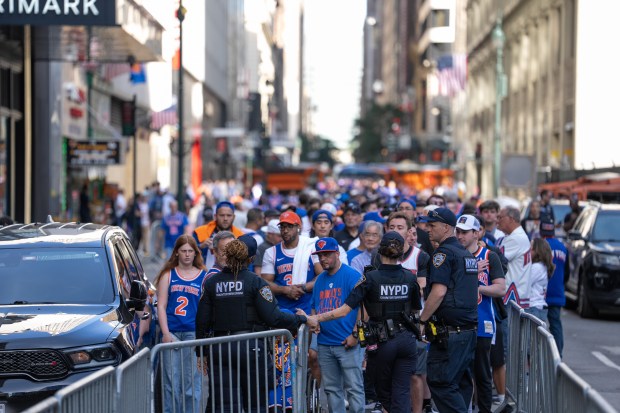 Knicks' fans wait to be screened by the NYPD on W. 33rd St. outside Madison Square Garden Monday, June 8, 2026 in Manhattan, New York. (Barry Williams/ New York Daily News)