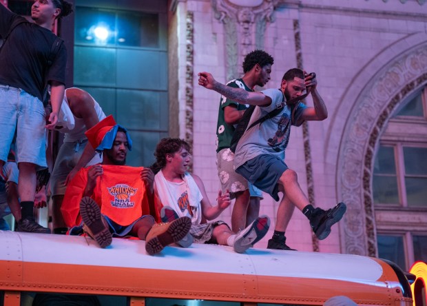 Knicks fans take over buses on w42nd St. after the Knicks defeated the Spurs Saturday, June 13, 2026 in Manhattan, New York. (Barry Williams/ New York Daily News)
