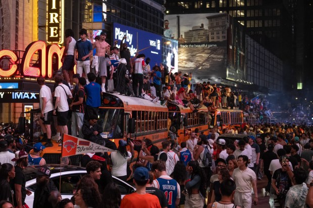 Knicks fans take over buses on w42nd St. after the Knicks defeated the Spurs Saturday, June 13, 2026 in Manhattan, New York. (Barry Williams/ New York Daily News)