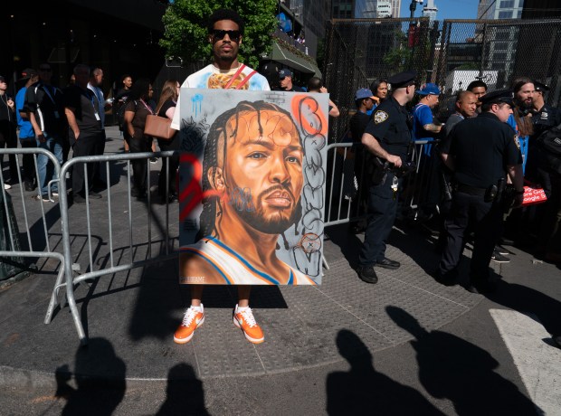 A Knicks fan shows his favorite player outside Madison Square Garden Monday, June 8, 2026 in Manhattan, New York. (Barry Williams/ New York Daily News)
