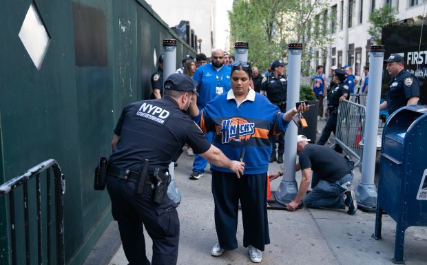 Knicks' fans are screened by the NYPD on W. 32rd St. outside Madison Square Garden Monday, June 8, 2026 in Manhattan, New York. (Barry Williams/ New York Daily News)