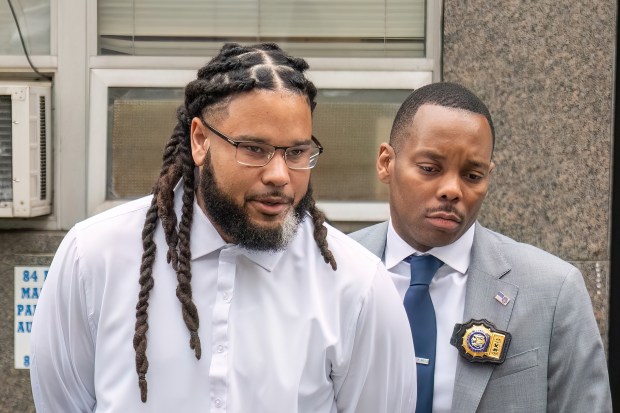 Gregory Ventura, left, is pictured after surrendering to police Monday morning.