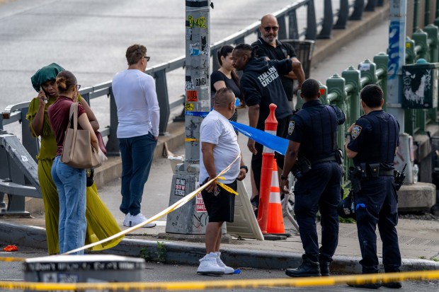 Police investigate after a 32-year-old man was was shot to death on W. 207th St. and Ninth Ave. in Inwood early Sunday.