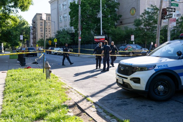 Police investigate after Reyna Caceres was fatally shot in the left eye on Aqueduct Ave. near W. 181st St. in the Bronx on Thursday, May 28, 2026. (Theodore Parisienne / New York Daily News)