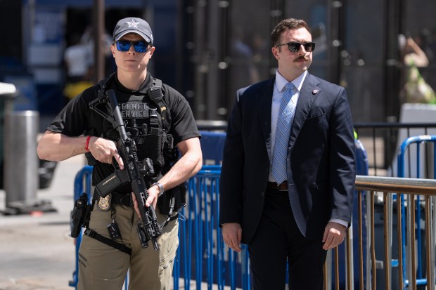 Two USSS officers stands post in the newly secured and fenced in area on W. 33rd St. outside Madison Square Garden Monday, June 8, 2026 in Manhattan, New York. (Barry Williams/ New York Daily News)