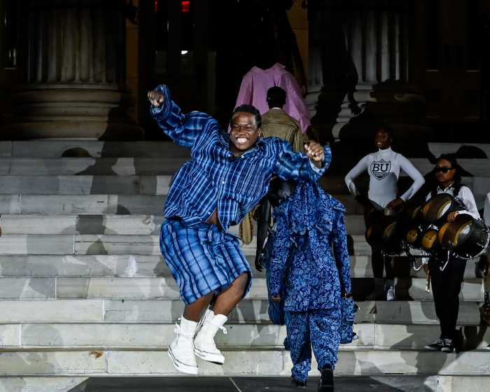 person on runway at fashion show