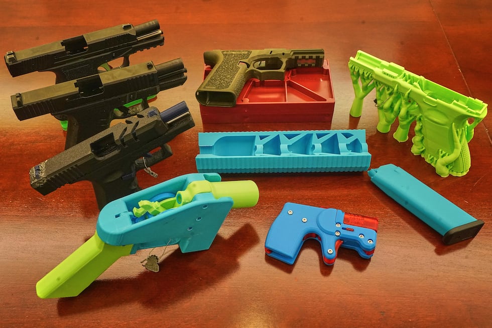 FILE - Ghost guns, provided by the New York City Police Department, are displayed in the...