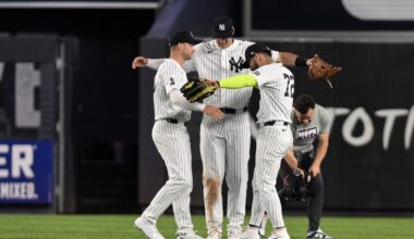 Jun 16, 2026; Bronx, New York, USA; New York Yankees shortstop Max Schuemann (30), right fielder Spencer Jones (78) and shortstop José Caballero (72) celebrate after winning against the Chicago White Sox at Yankee Stadium.