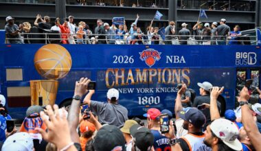 Jun 18, 2026; New York, NY, USA; A New York Knicks Champions bus passes during the New York Knicks Championship Parade through the Canyon of Heroes.