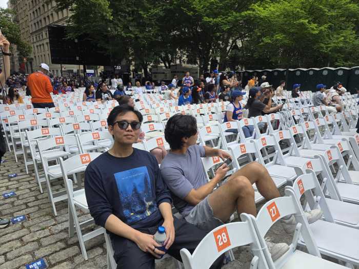 Jesse Wu (left) snagged tickets to Thursday's ceremony Photo by Shane O'Brien. 
