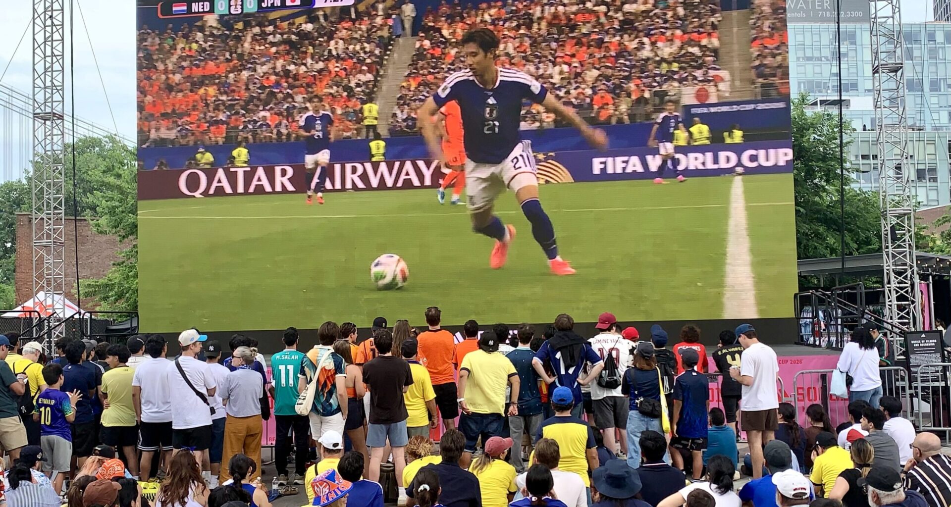 The crowd watches the Japan vs. Netherlands game on the giant screen at the adidas Brooklyn World Cup Fan Zone. Photo: Mary Frost/Brooklyn Eagle