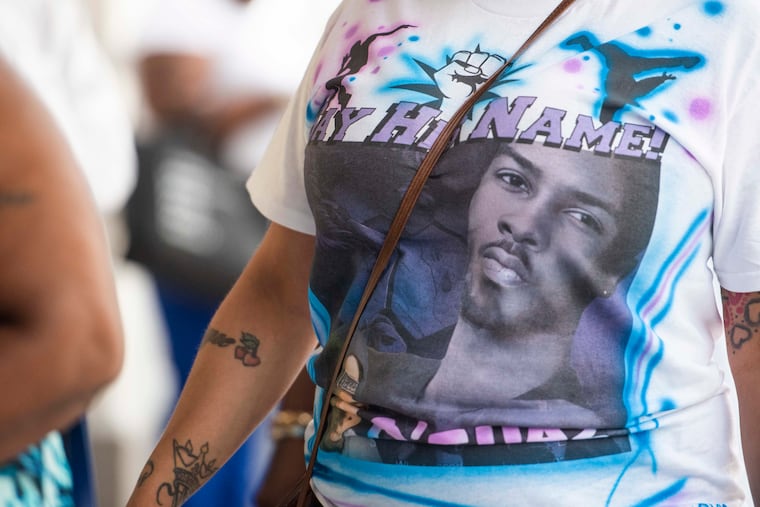 Philly dancer O’Shae Sibley, seen here on a mourner's shirt, was stabbed to death at a Brooklyn gas station in 2023.