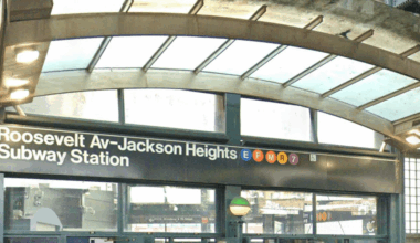 Woman stabbed in neck, hand on Queens E train