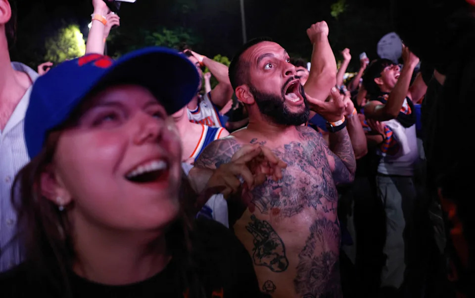 Knicks fans celebrate in Central Park.