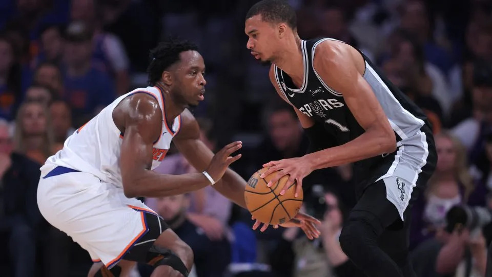 San Antonio Spurs forward Victor Wembanyama controls the ball against New York Knicks forward OG Anunoby in the second quarter. - Brad Penner/Imagn/Reuters