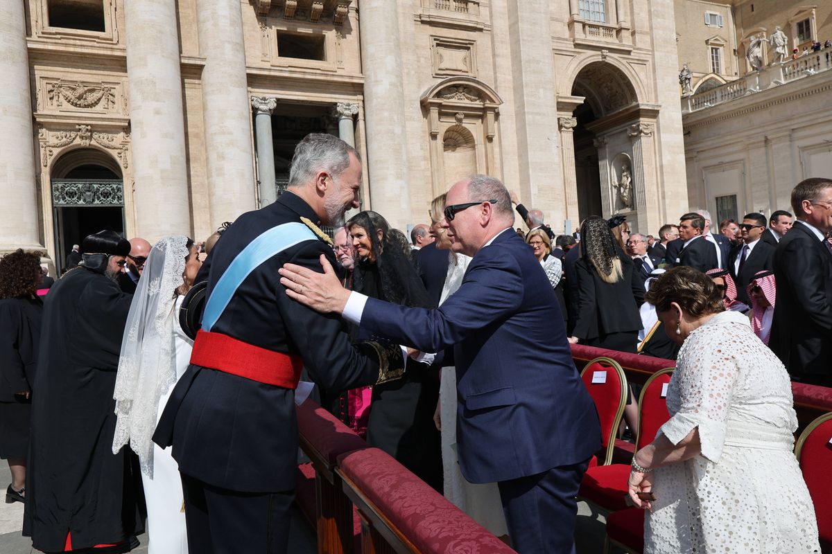 King Felipe VI and Prince Albert of Monaco greet each other during their meeting linked to the papal visit in Vatican City.