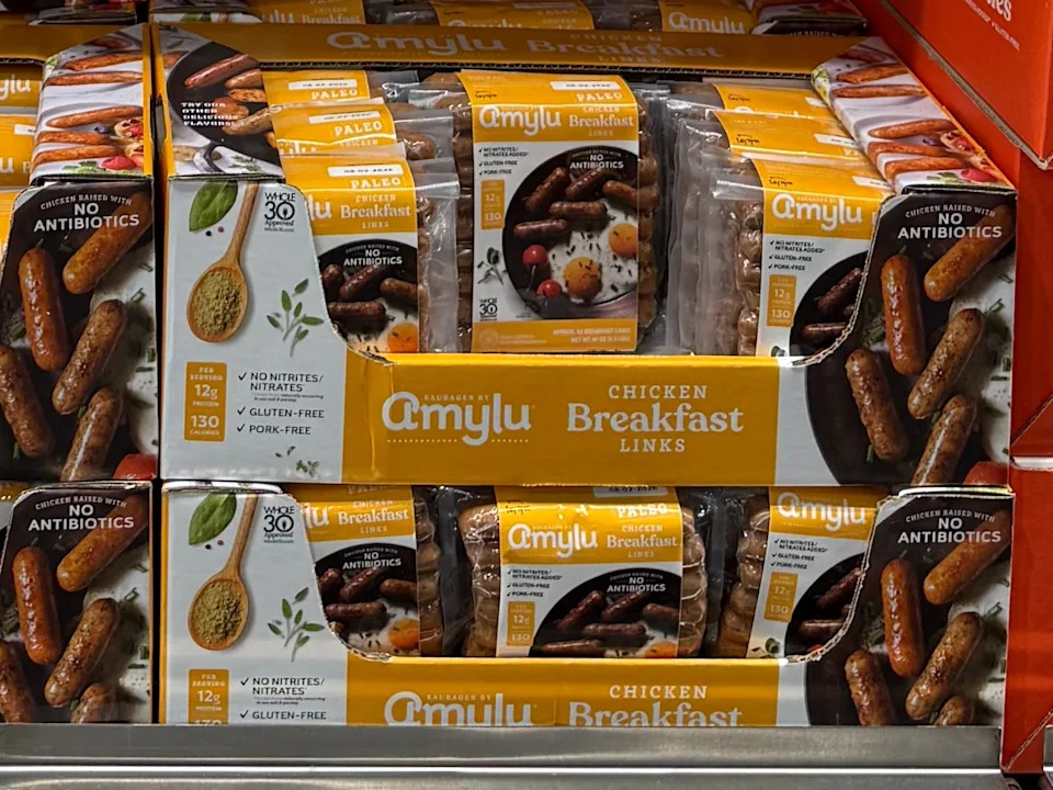 Multiple packages of Amylu chicken breakfast sausage links.