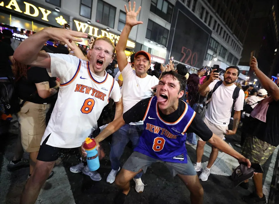 New York Knicks fans celebrate outside Madison Square Garden after their team’s Game 4 victory over the San Antonio Spurs in the NBA Finals in New York on June 10, 2026. AFP via Getty Images