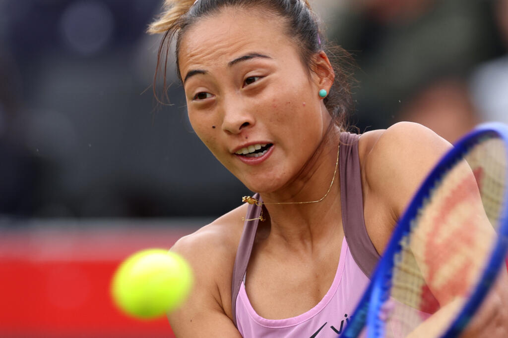 China's Zheng Qinwen on her way to defeat by Romania's Jaqueline Cristian in the WTA tournament at London's Queen's Club