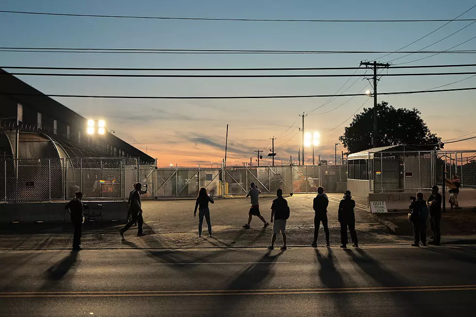 NEWARK, NEW JERSEY - JUNE 09: Protesters block the entrance to Delaney Hall Immigration Detention Center on June 09, 2026 in Newark, New Jersey. (Photo by Michael M. Santiago/Getty Images)