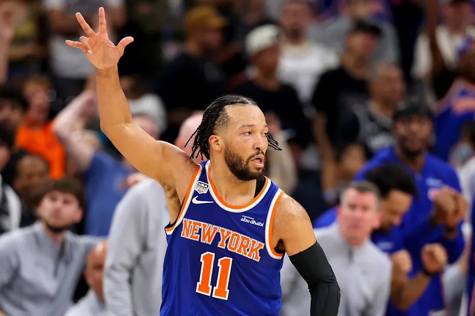 Jalen Brunson #11 of the New York Knicks reacts after his made three-point basket against the San Antonio Spurs.