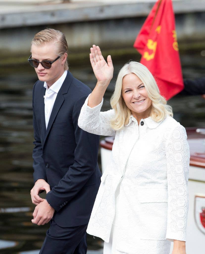 Marius Borg Hoiby with a waving Crown Princess Mette-Marit