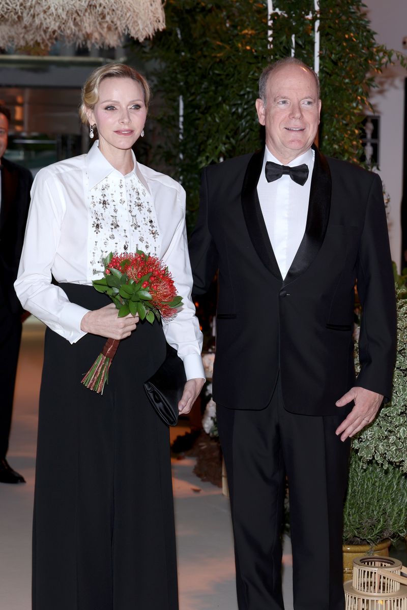 Charlene of Monaco chose a crystal-embroidered shirt and flowing black skirt for the traditional post-race gala dinner.