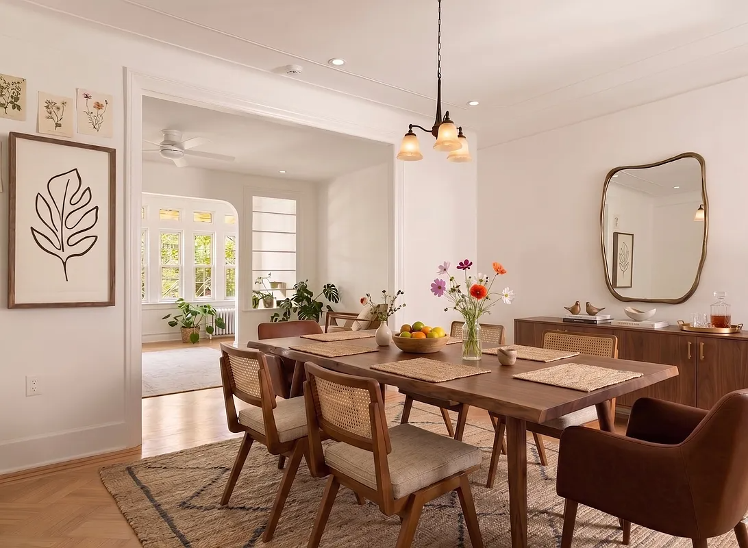 virtually staged dining room with wood floor