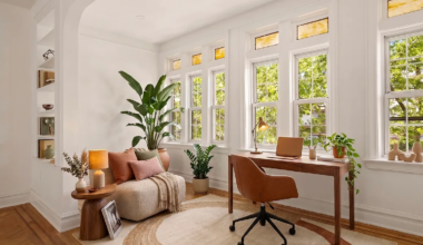 bay ridge - virtually staged living room with arched niche set up as an office