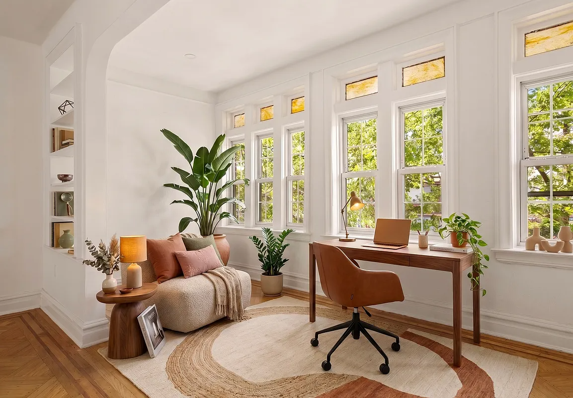 bay ridge - virtually staged living room with arched niche set up as an office