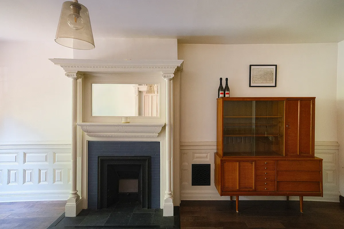 brooklyn living room with mantel, wainscoting