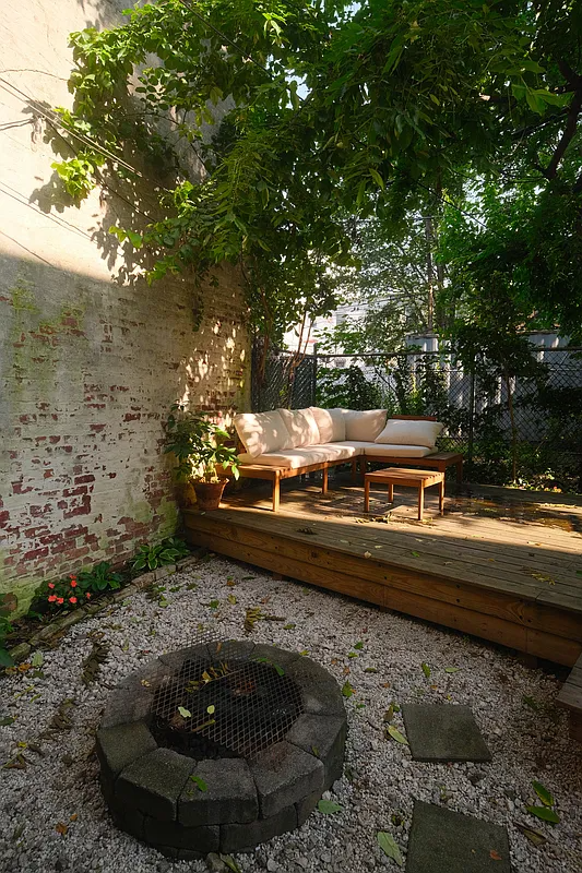 rear yard with raised platform at rear for seating